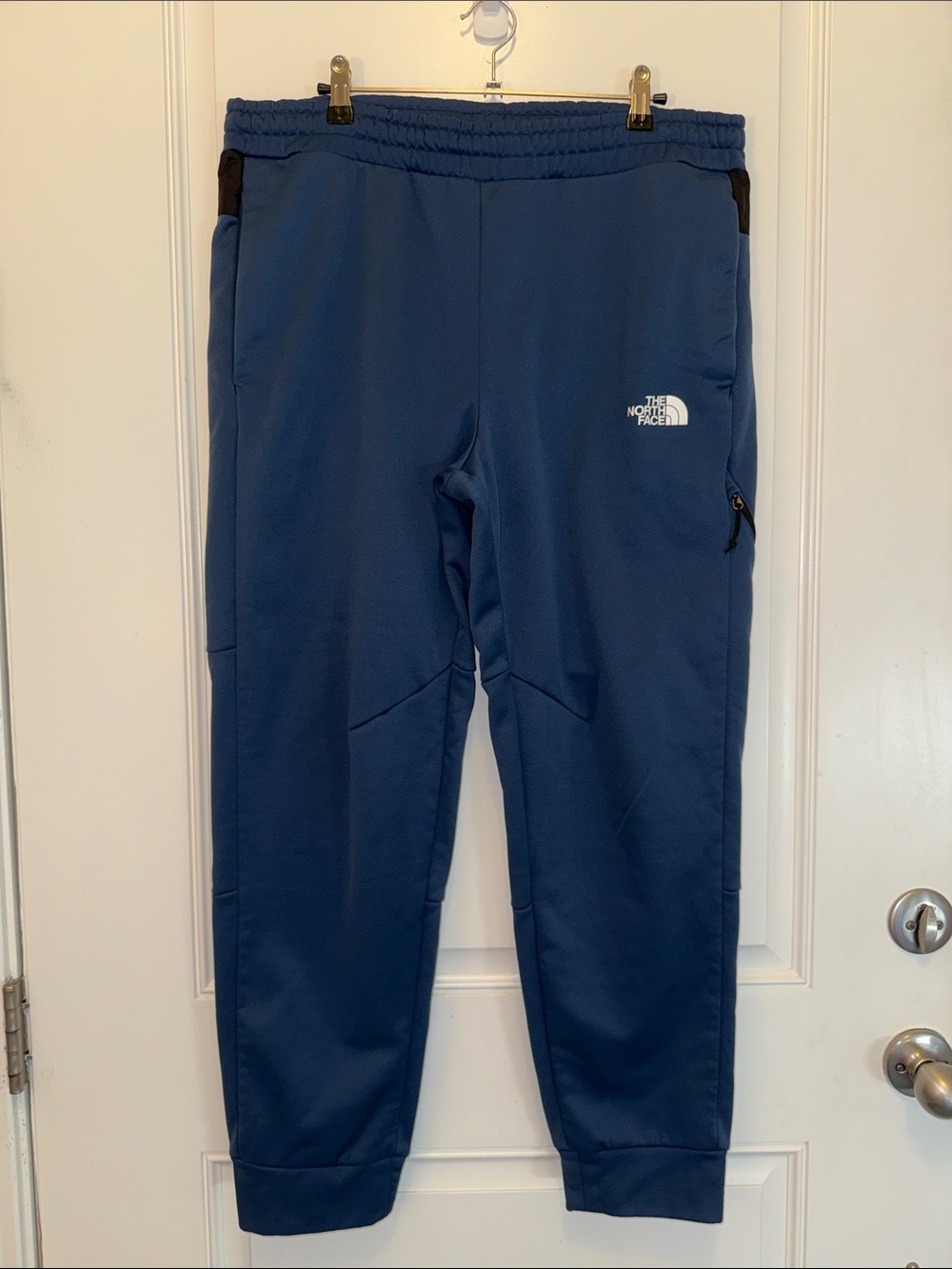 The Northface men’s navy teal blue tech fleece line, joggers size, large pants